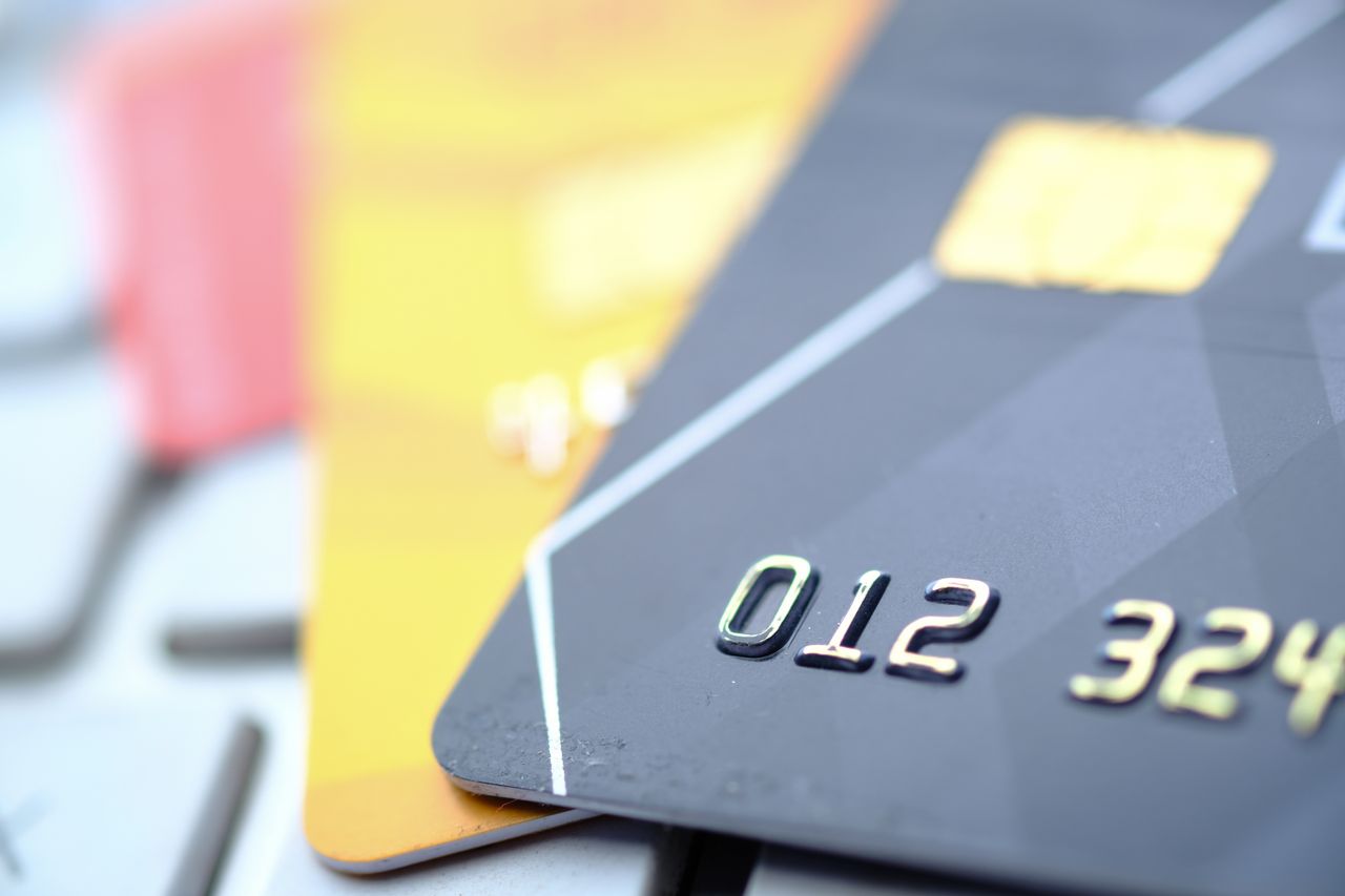 hero-img-02 High-quality close-up of credit and debit cards, highlighting technology and security.